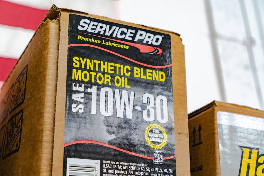 Case of Service Pro SAE 10W-30 synthetic blend motor oil